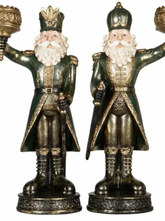 nötknäppare ljusstake i grön färg, två stående figurer med upplyfta ljushållare och gulddetaljer