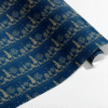 Presentpapper med guldiga träd och djur – blå kraftpapper 70x200 cm