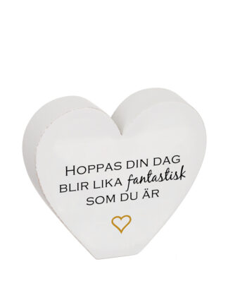 vitt stående hjärta med svart text 'hoppas din dag blir lika fantastisk som du är' och litet guldfärgat hjärta