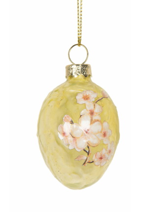 Grönt glasägg påskdekoration med målade vita körsbärsblommor, hängande i guldfäste
