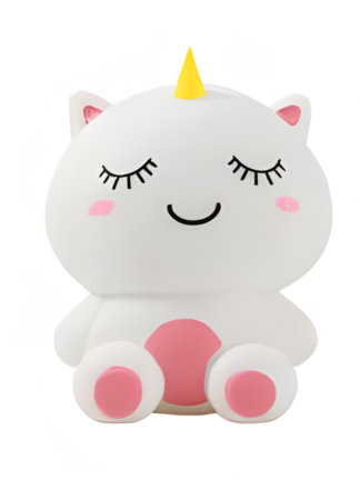 vit mjuk klämleksak enhörning med gult horn, stängda ögon, rosa kinder och rosa trampdynor på vit bakgrund