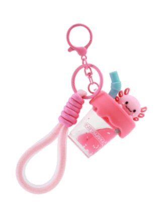 Axolotl nyckelring med rosa bubble tea-design och handledsrem